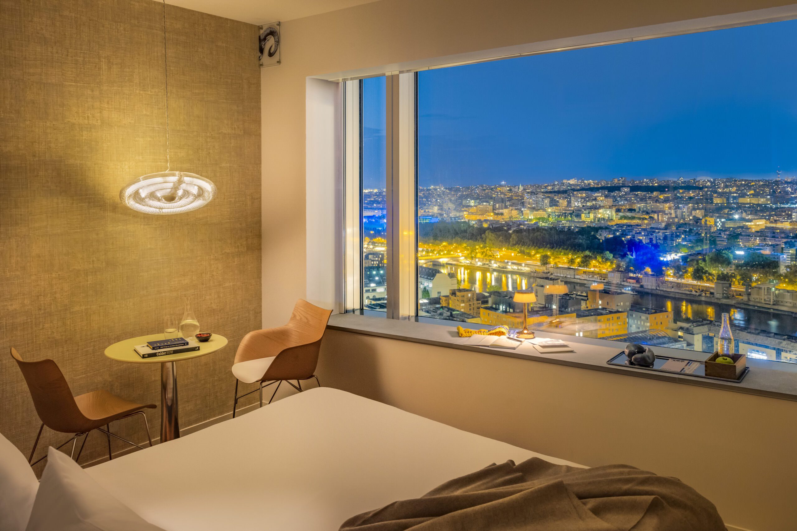 Design room at TOO Hotel with a panoramic view of Paris and decor by Philippe Starck.